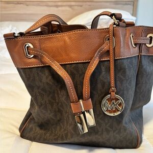 Michael Kors Brown Monogram Drawstring Shoulder Bag with Tan Trim